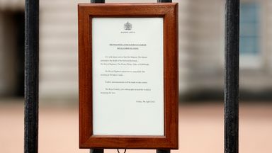 An announcement regarding the death of Britain's Prince Philip is displayed on the fence of Buckingham Palace in London, Friday, April 9, 2021. Buckingham Palace officials say Prince Philip, the husband of Queen Elizabeth II, has died. He was 99. Philip spent a month in hospital earlier this year before being released on March 16 to return to Windsor Castle. (AP Photo/Matt Dunham)
